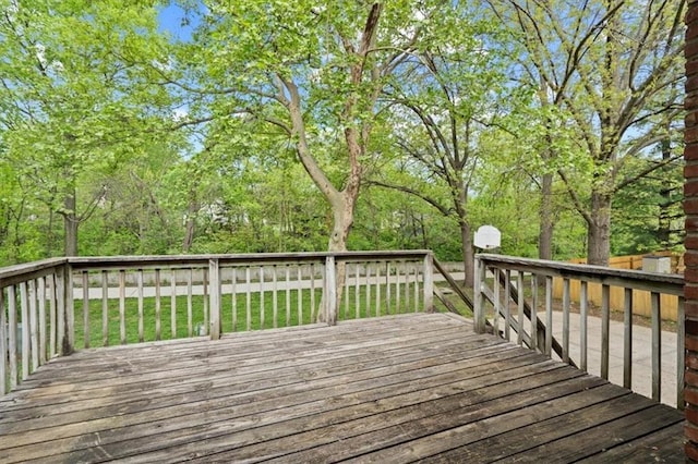 deck featuring a lawn