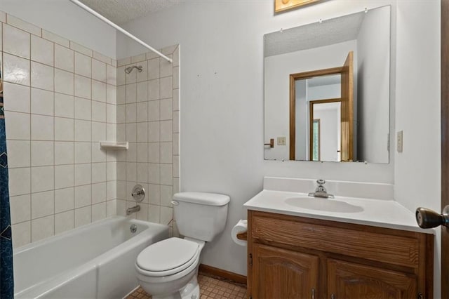 full bathroom featuring a textured ceiling, shower / tub combo, baseboards, vanity, and toilet