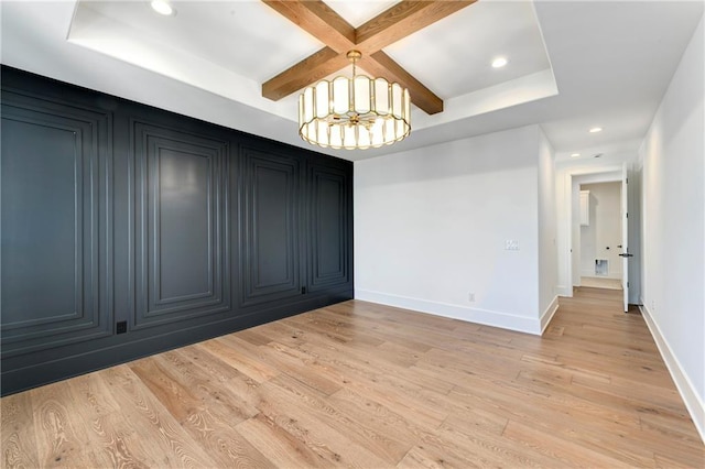 unfurnished room featuring baseboards, a chandelier, light wood finished floors, and recessed lighting