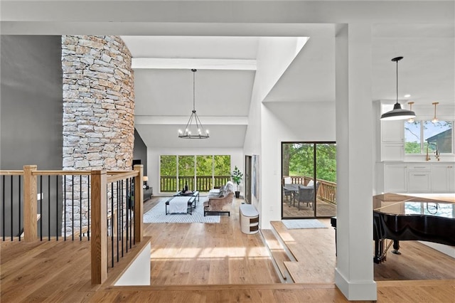 224 NW Locust St, Lees Summit, MO 64064 - foyer featuring wood finished floors and a chandelier