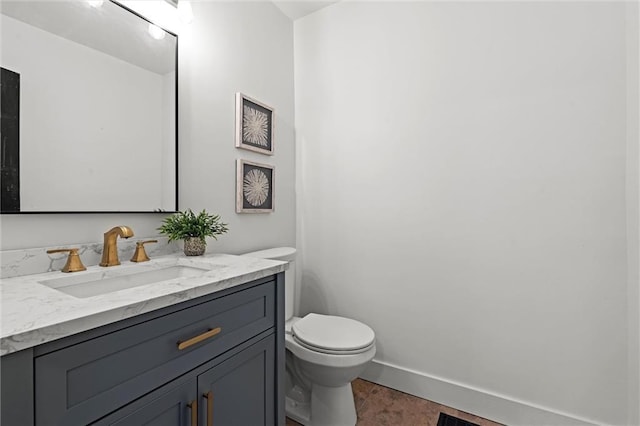 224 NW Locust St, Lees Summit, MO 64064 - bathroom featuring vanity and toilet