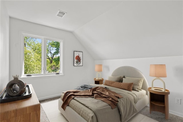 224 NW Locust St, Lees Summit, MO 64064 - bedroom with lofted ceiling and light carpet