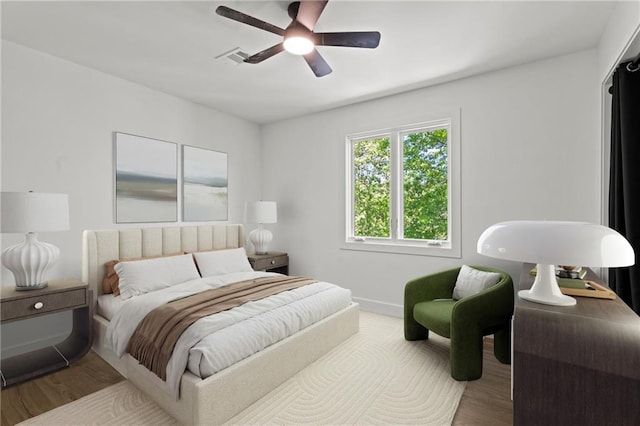 224 NW Locust St, Lees Summit, MO 64064 - bedroom with wood finished floors and ceiling fan