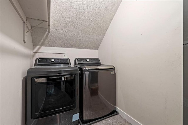 224 NW Locust St, Lees Summit, MO 64064 - laundry area featuring washing machine and dryer, a textured ceiling, and carpet
