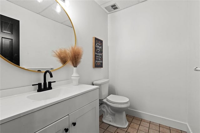 224 NW Locust St, Lees Summit, MO 64064 - half bathroom featuring vanity and tile patterned flooring