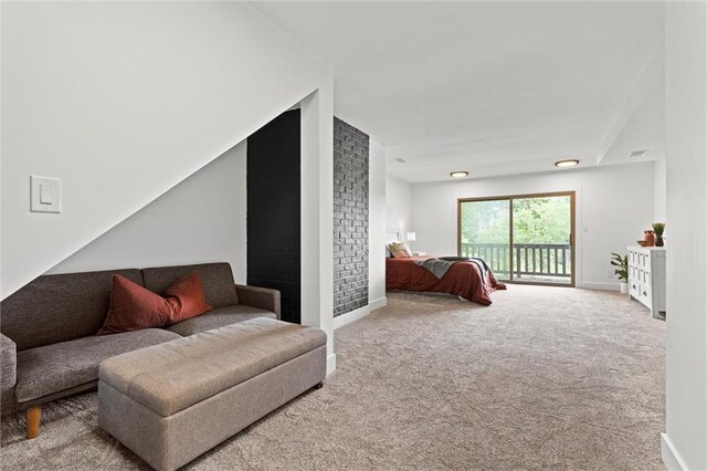 224 NW Locust St, Lees Summit, MO 64064 - bedroom featuring access to outside and carpet