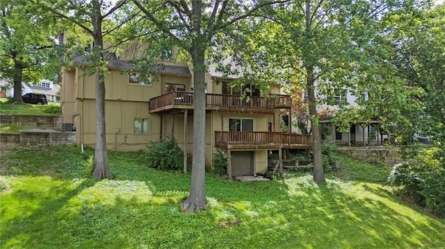 224 NW Locust St, Lees Summit, MO 64064 - back of property featuring a wooden deck and a lawn