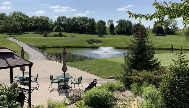 224 NW Locust St, Lees Summit, MO 64064 - view of community with a water view, a lawn, view of golf course, and view of scattered trees