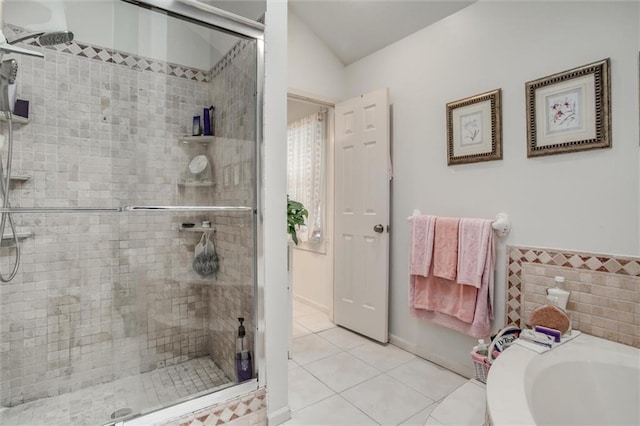 653 NE Reed Xing, Lees Summit, MO 64086 - full bath with a shower stall and tile patterned flooring