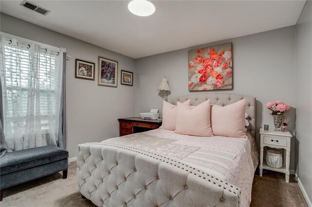 653 NE Reed Xing, Lees Summit, MO 64086 - carpeted bedroom with visible vents and baseboards