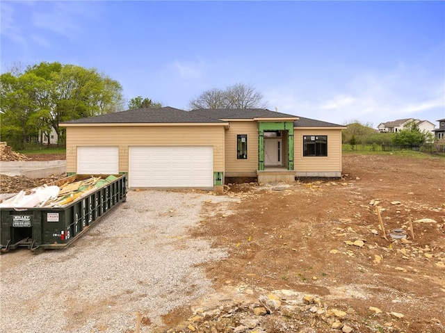 14266 S Houston St, Olathe, KS 66061 - view of front of property featuring driveway and an attached garage