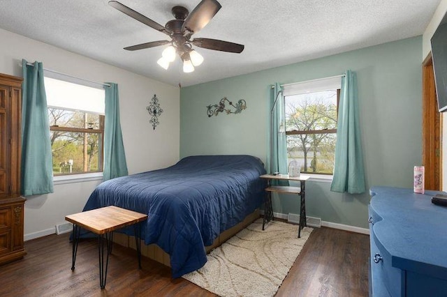 108 Sunrise Ct, Ozawkie, KS 66070 - bedroom with baseboards, multiple windows, and wood finished floors