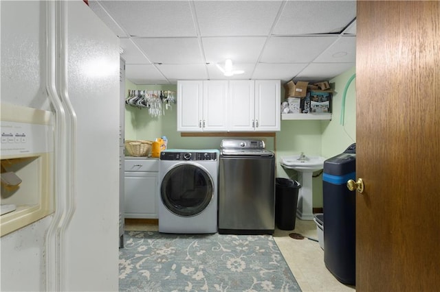 108 Sunrise Ct, Ozawkie, KS 66070 - washroom with cabinet space, washer and dryer, and a sink