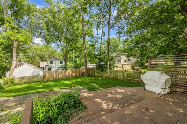 7235 Main St, Kansas City, MO 64114 - fenced backyard featuring a deck