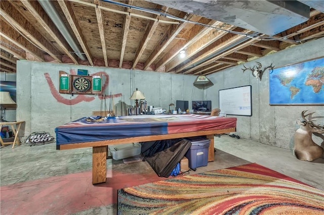 rec room featuring concrete floors