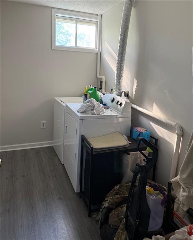614 SE 145th Rd, Warrensburg, MO 64093 - laundry area with baseboards, laundry area, separate washer and dryer, and wood finished floors