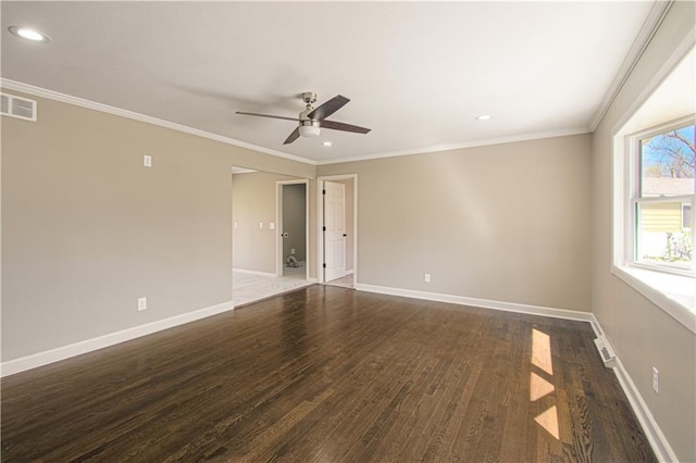 3422 N 71st St, Kansas City, KS 66109 - spare room with baseboards, visible vents, a ceiling fan, and dark wood-style floors