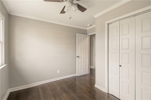 3422 N 71st St, Kansas City, KS 66109 - unfurnished bedroom featuring dark wood finished floors, baseboards, a closet, ceiling fan, and crown molding