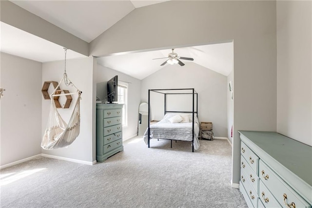 bedroom featuring light carpet, vaulted ceiling, baseboards, and ceiling fan
