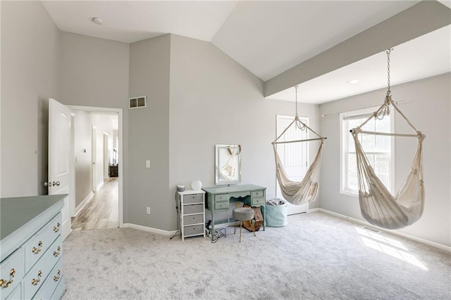 interior space with high vaulted ceiling, a chandelier, baseboards, carpet flooring, and visible vents