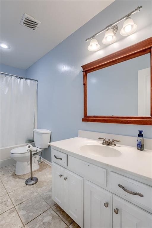 full bath featuring tile patterned floors, vanity, baseboards, toilet, and visible vents