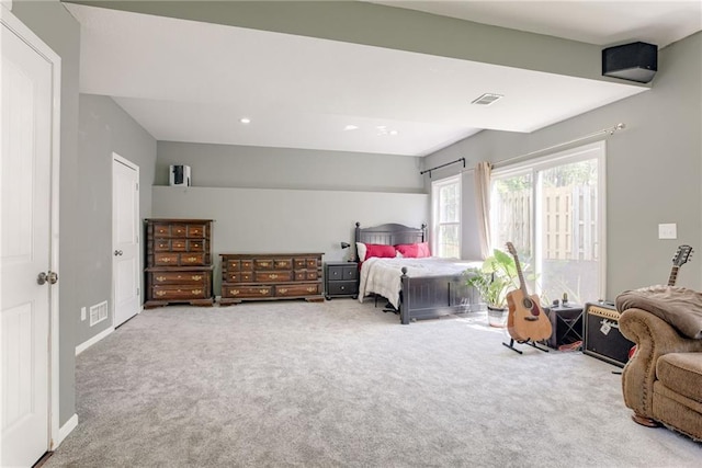 carpeted bedroom featuring recessed lighting and visible vents
