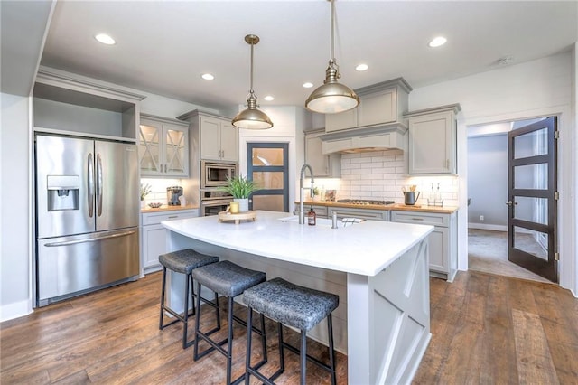 8120 Lone Elm Rd, Lenexa, KS 66220 - kitchen with appliances with stainless steel finishes, gray cabinetry, light countertops, a sink, and recessed lighting