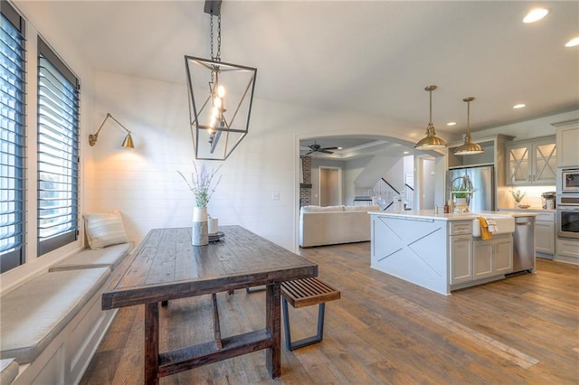 8120 Lone Elm Rd, Lenexa, KS 66220 - kitchen featuring stainless steel appliances, dark wood-type flooring, healthy amount of natural light, and recessed lighting