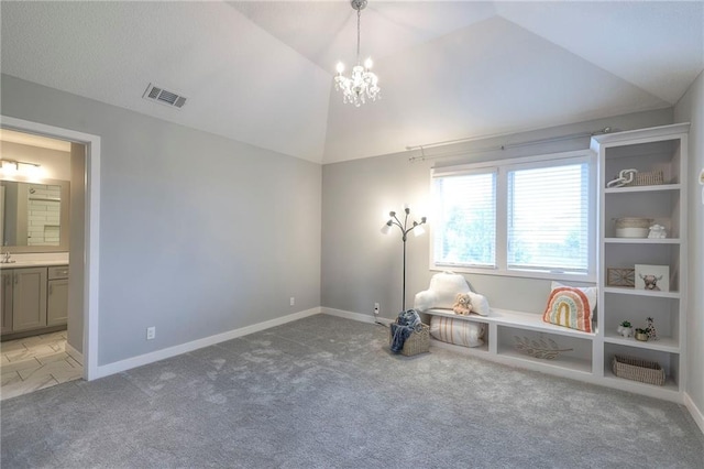 8120 Lone Elm Rd, Lenexa, KS 66220 - bedroom with light colored carpet, a chandelier, vaulted ceiling, ensuite bath, and baseboards