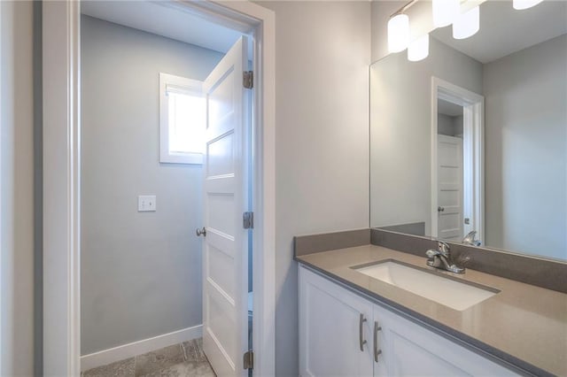 8120 Lone Elm Rd, Lenexa, KS 66220 - bathroom with vanity and baseboards