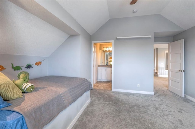 8120 Lone Elm Rd, Lenexa, KS 66220 - bedroom with lofted ceiling, carpet flooring, baseboards, ensuite bathroom, and ceiling fan