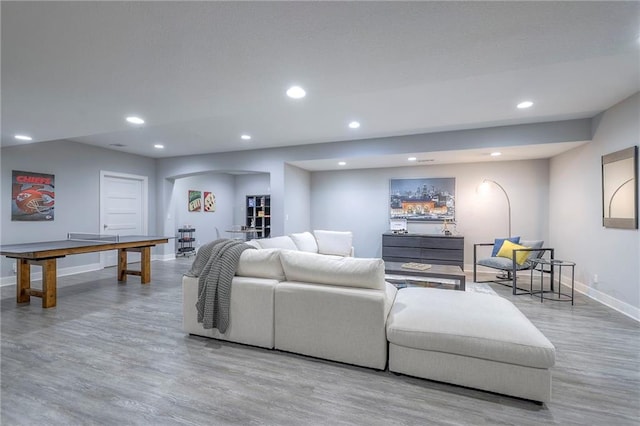 8120 Lone Elm Rd, Lenexa, KS 66220 - living area with wood finished floors, baseboards, and recessed lighting