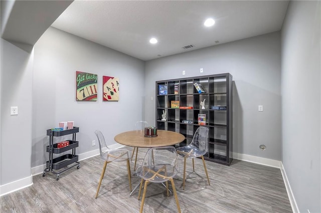 8120 Lone Elm Rd, Lenexa, KS 66220 - dining area with wood finished floors, baseboards, and recessed lighting
