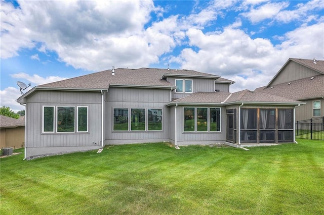 8120 Lone Elm Rd, Lenexa, KS 66220 - back of house featuring a sunroom, roof with shingles, and central air condition unit