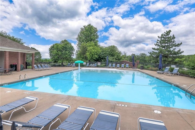 8120 Lone Elm Rd, Lenexa, KS 66220 - community pool featuring a patio area