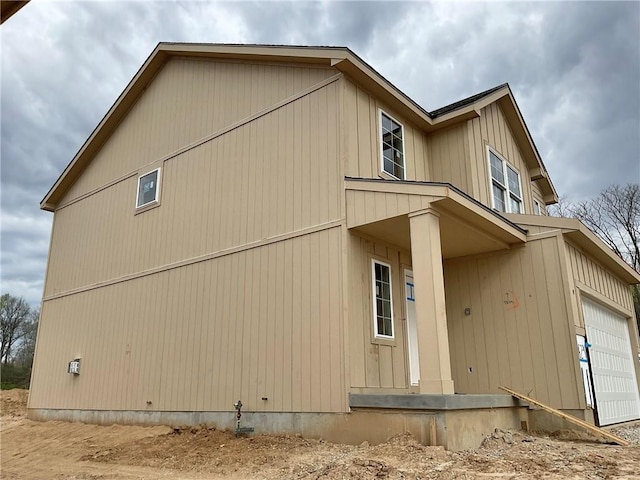 view of property exterior featuring a garage