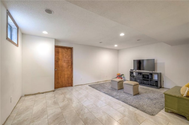 living area featuring recessed lighting