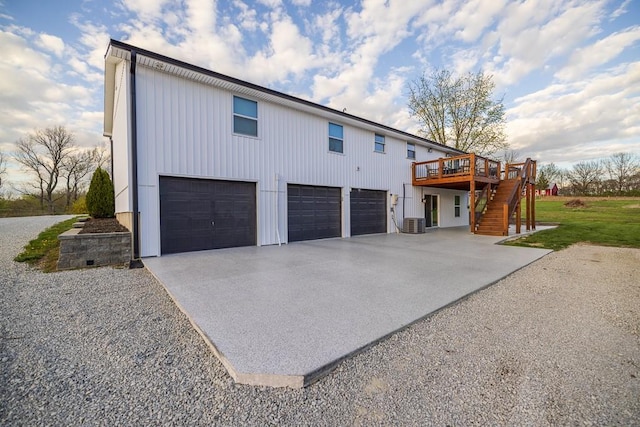 20609 NE 161st St, Kearney, MO 64060 - exterior space featuring stairs, central AC unit, driveway, and a deck