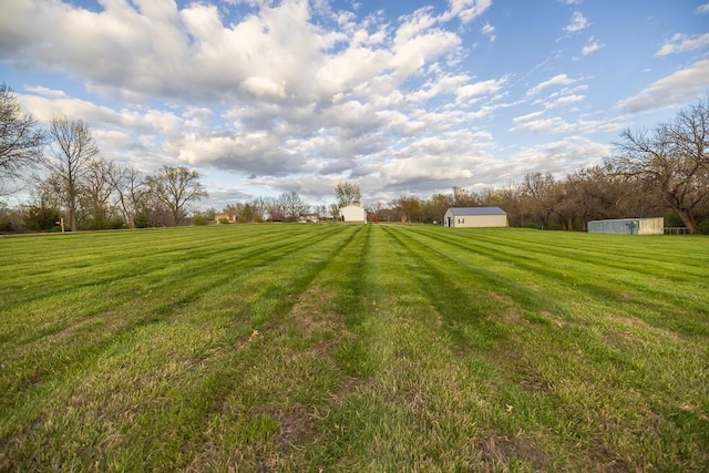 20609 NE 161st St, Kearney, MO 64060 - view of yard featuring a rural view, an outdoor structure, and a shed