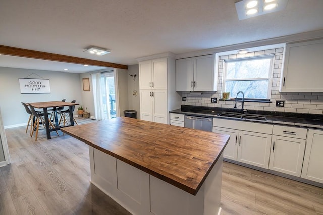 20609 NE 161st St, Kearney, MO 64060 - kitchen featuring a sink, butcher block counters, light wood finished floors, and dishwasher