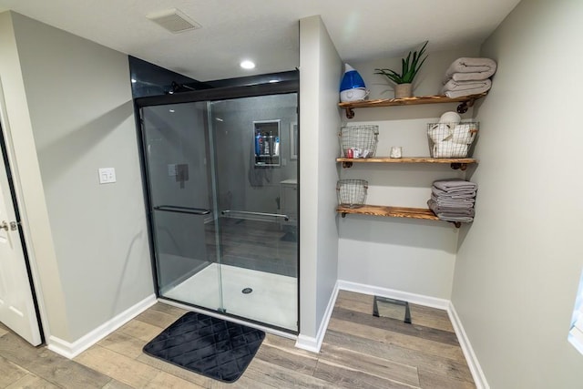 20609 NE 161st St, Kearney, MO 64060 - bathroom with baseboards, a shower stall, and wood finished floors