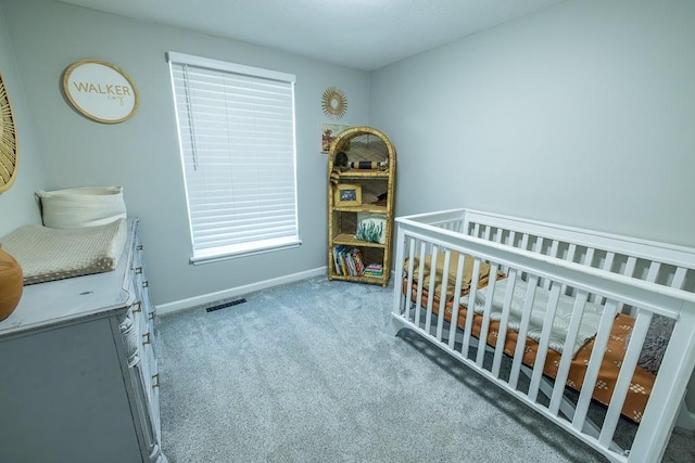 20609 NE 161st St, Kearney, MO 64060 - carpeted bedroom with baseboards, a nursery area, and visible vents