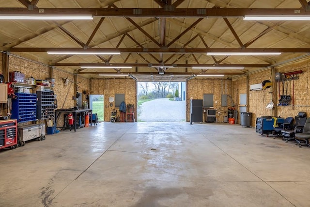 20609 NE 161st St, Kearney, MO 64060 - garage with electric panel and a workshop area
