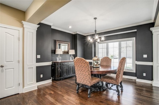 dining room with baseboards, an inviting chandelier, ornamental molding, and dark wood finished floors