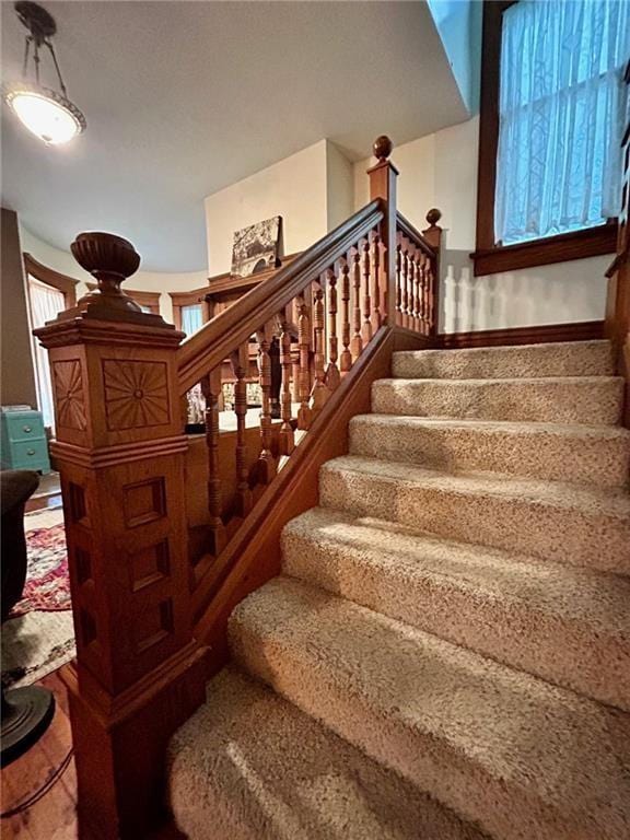 staircase with baseboards