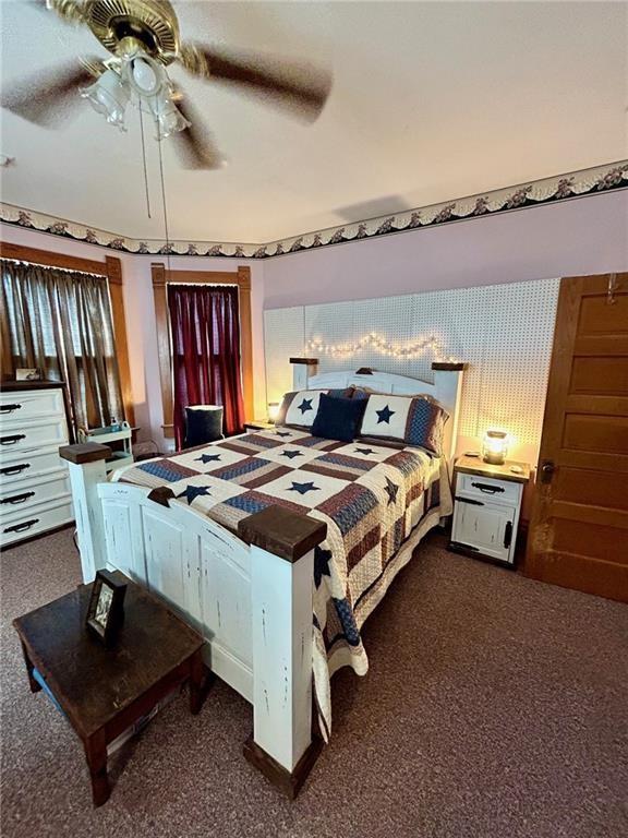 bedroom featuring carpet floors and a ceiling fan