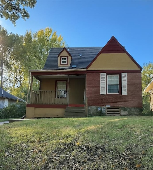 5610 Euclid Ave, Kansas City, MO 64130 - view of front of property with a front yard and covered porch