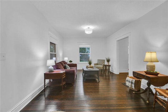 1610 S Northern Blvd, Independence, MO 64052 - living room with wood finished floors, visible vents, and baseboards