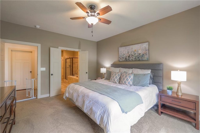 carpeted bedroom with baseboards and ceiling fan