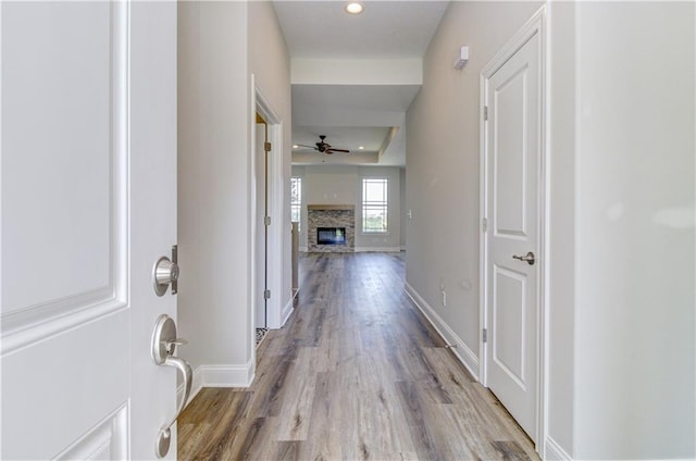 1828 N 92nd Ter, Kansas City, KS 66112 - hallway featuring baseboards and wood finished floors